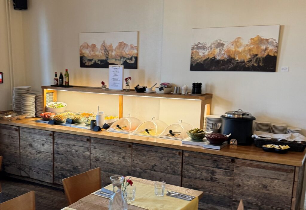 De Gamlas Hem Lunch Buffet. We welcome you to our wooden Art Nouveau villa to enjoy peace and excellent food, embraced by historic tiled stoves and warm log walls.